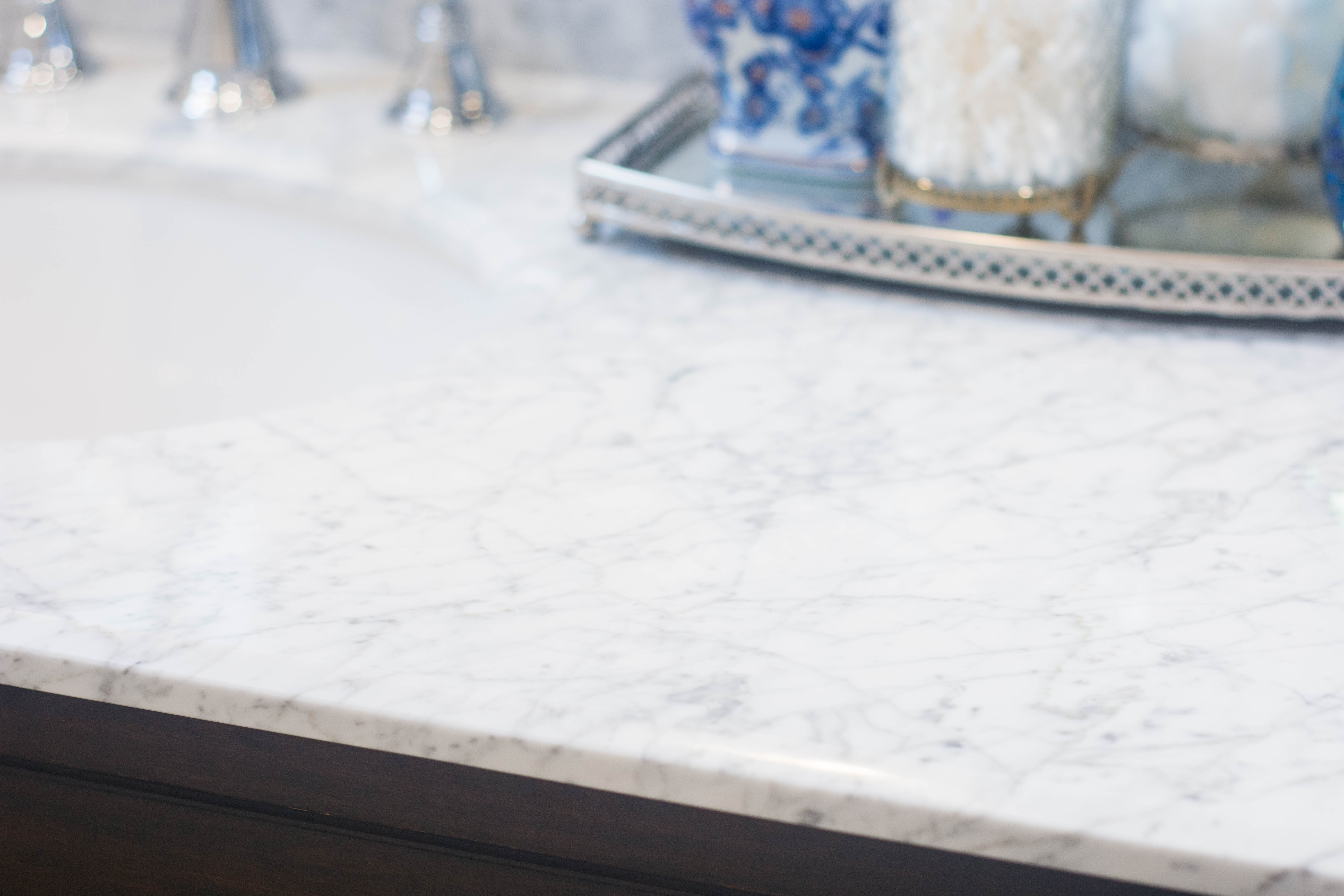 carrera-marble-countertop-vintage-retro-widespread-sink-faucet-bathroom-renovation-remodel.jpg