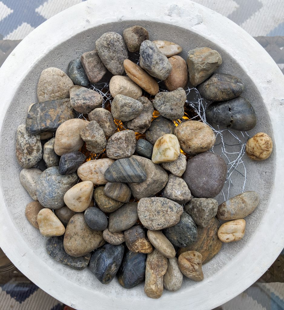 fill with rocks DIY concrete fire bowl Montreal lifestyle beauty fashion blog