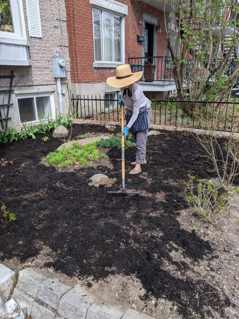 spreading mulch DIY front yard landscaping Montreal lifestyle fashion beauty blog