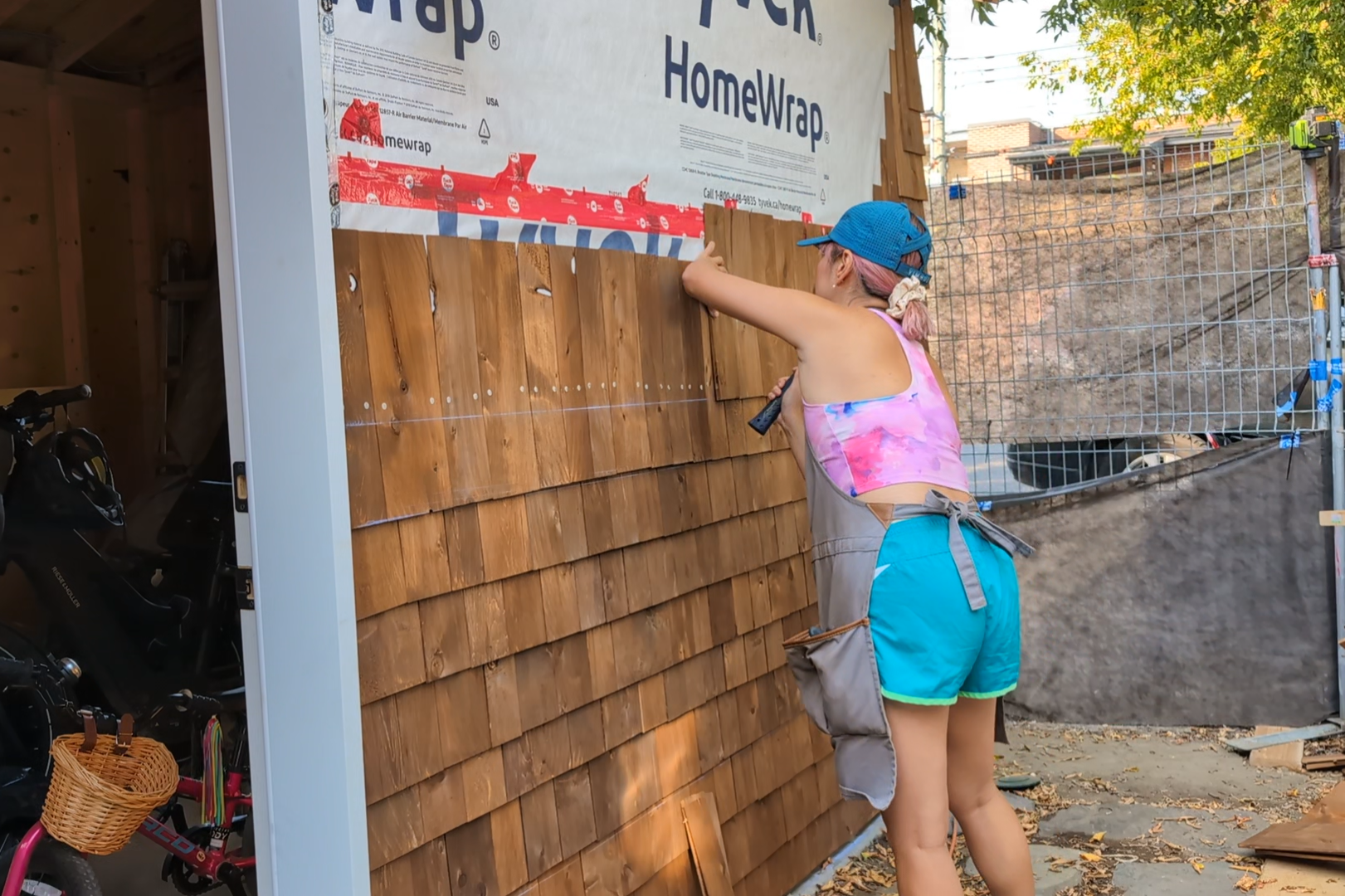 adding cedar shingles DIY shed remodel